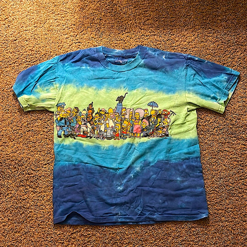 Is brand new just used 1 time it’s a really cute tshirt and I hope u like it